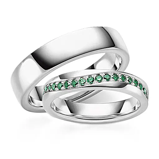 Белые обручальные кольца с изумрудами